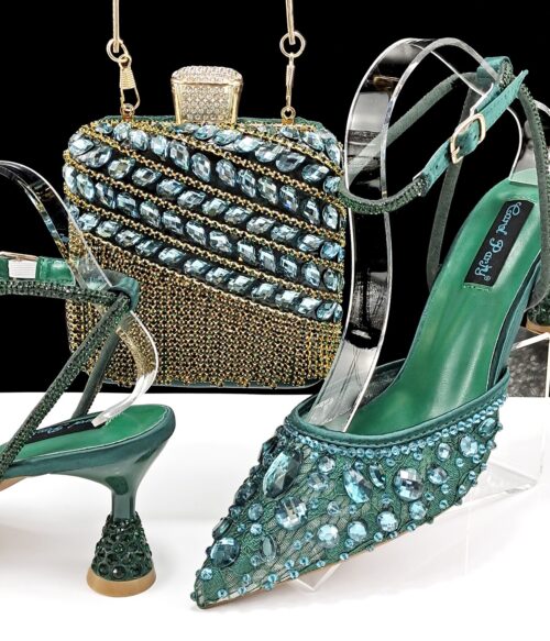 A set of green crystal-embellished slingback heels and a matching structured clutch with gold fringe and rhinestone detail.